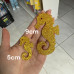 Aplique glitter cavalo marinho dourado